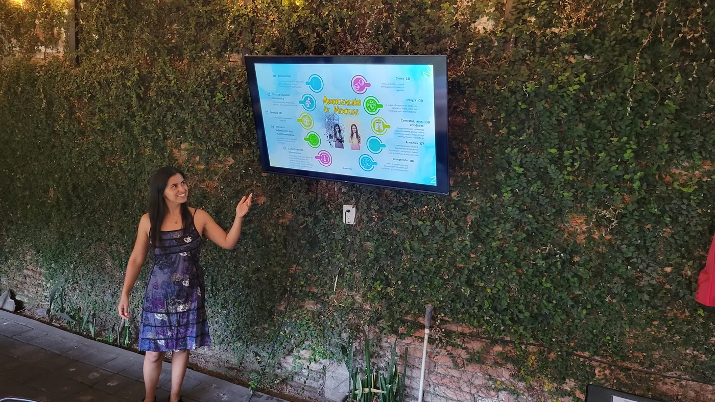 Alicia presenting Memory Harmonization material on a screen